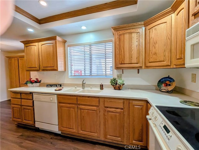5499 Paseo Del Lago W Unit 3D, Laguna Woods, CA 92637 - kitchen with white appliances, ornamental molding, a tray ceiling, recessed lighting, and dark wood finished floors