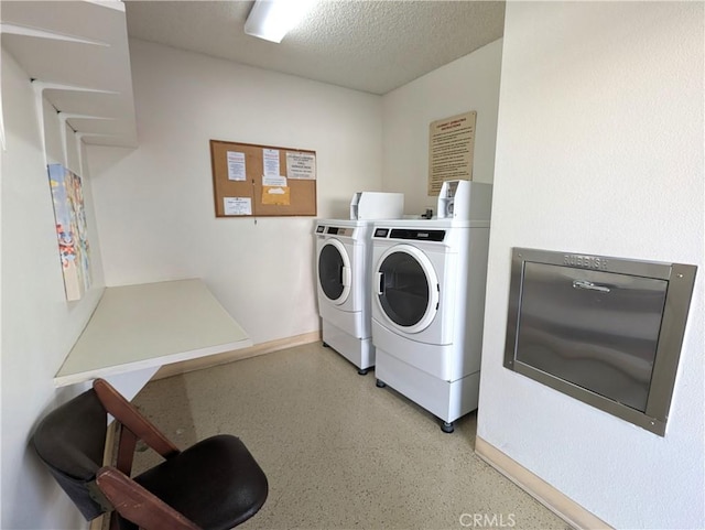 5499 Paseo Del Lago W Unit 3D, Laguna Woods, CA 92637 - washroom featuring separate washer and dryer and a textured ceiling