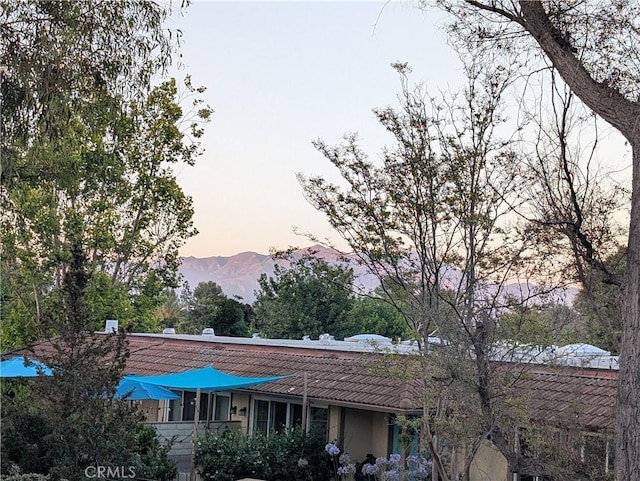 5499 Paseo Del Lago W Unit 3D, Laguna Woods, CA 92637 - view of building exterior with a mountain view