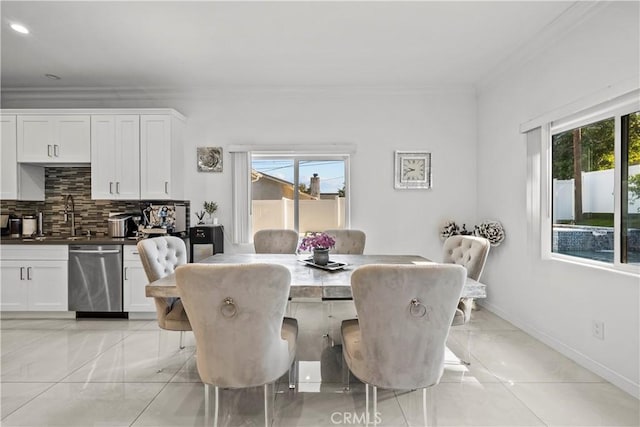 11209 Forbes Ave, Granada Hills, CA 91344 - dining room featuring ornamental molding, plenty of natural light, light marble finish floors, and recessed lighting
