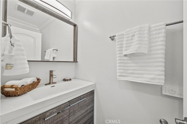 11209 Forbes Ave, Granada Hills, CA 91344 - bathroom featuring ornamental molding and vanity