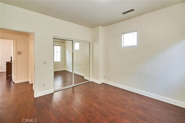 717 Arcadia Ave Unit C, Arcadia, CA 91007 - unfurnished bedroom with dark wood-type flooring and a closet