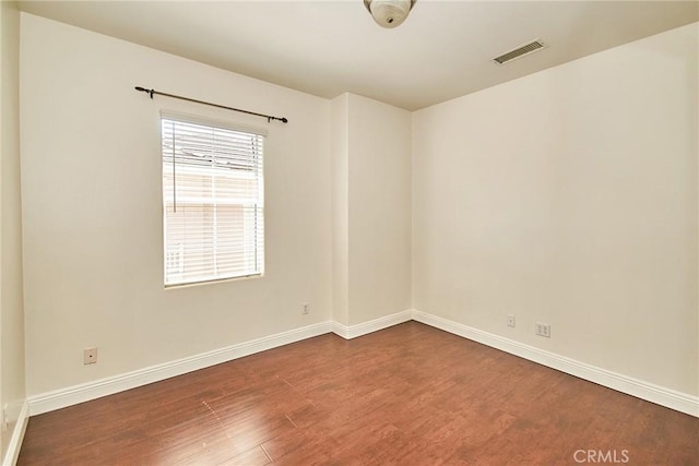 717 Arcadia Ave Unit C, Arcadia, CA 91007 - spare room with dark wood-type flooring and baseboards