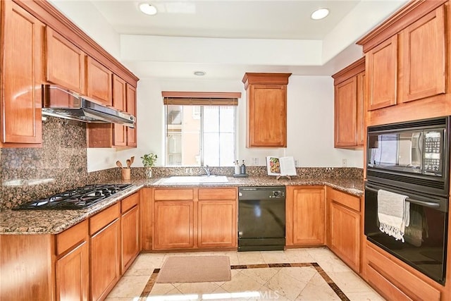 717 Arcadia Ave Unit C, Arcadia, CA 91007 - kitchen featuring black appliances, inlaid floor details, under cabinet range hood, dark stone countertops, and recessed lighting