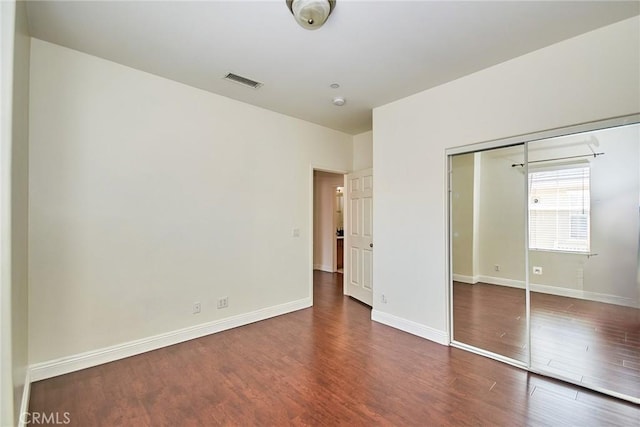 717 Arcadia Ave Unit C, Arcadia, CA 91007 - unfurnished bedroom with wood finished floors and a closet