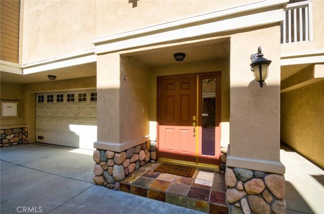 717 Arcadia Ave Unit C, Arcadia, CA 91007 - entrance to property featuring stucco siding, stone siding, and a garage