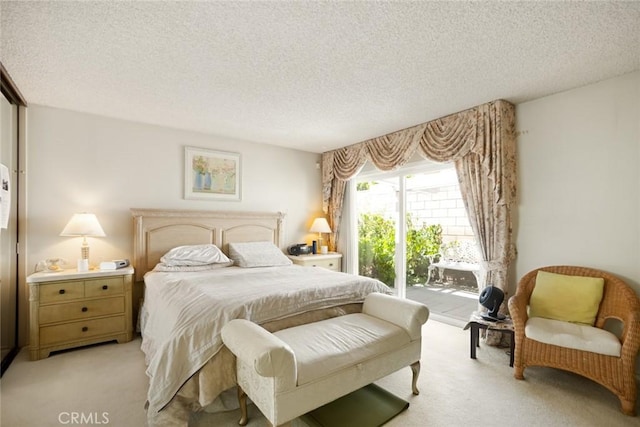 23484 Coyote Springs Dr, Diamond Bar, CA 91765 - bedroom featuring light carpet, access to outside, and a textured ceiling