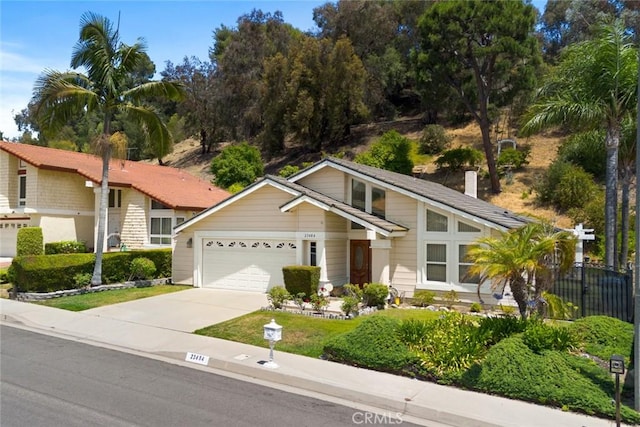 23484 Coyote Springs Dr, Diamond Bar, CA 91765 - mid-century home featuring a garage and concrete driveway