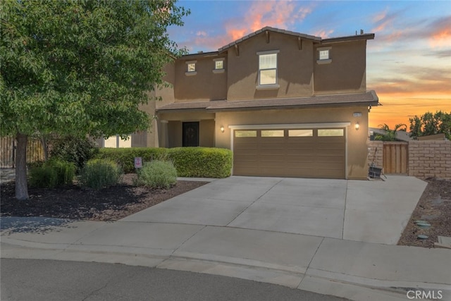 31572 Via Del Paso, Winchester, CA 92596 - traditional-style home featuring a garage, stucco siding, and concrete driveway