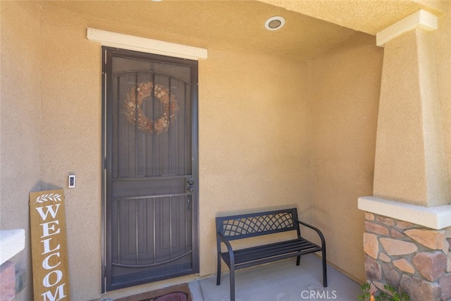 31572 Via Del Paso, Winchester, CA 92596 - view of exterior entry with stucco siding