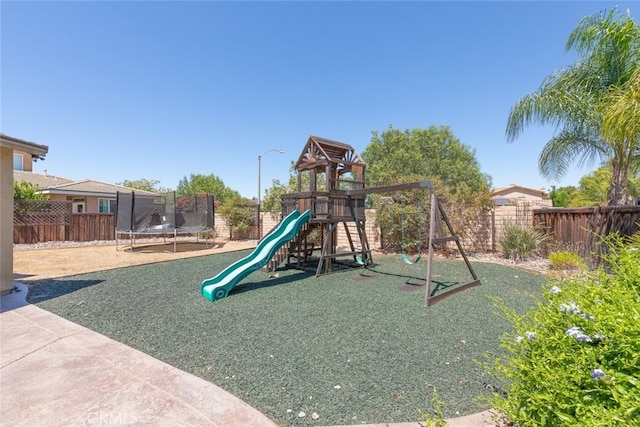 31572 Via Del Paso, Winchester, CA 92596 - view of jungle gym with a trampoline and a fenced backyard