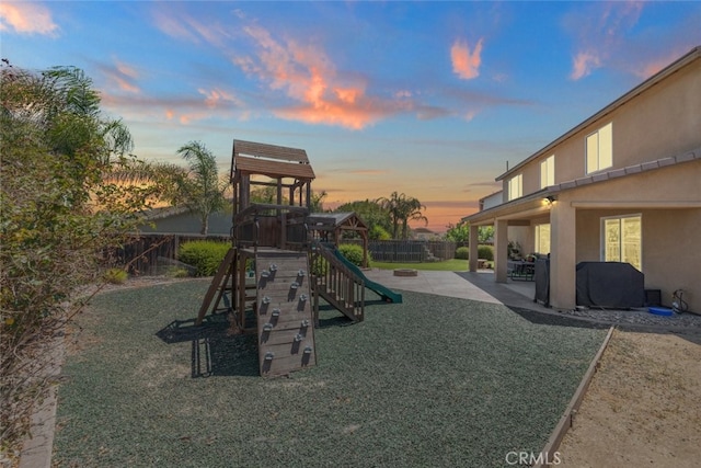 31572 Via Del Paso, Winchester, CA 92596 - playground at dusk with a playground and a patio