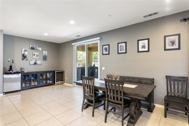 31572 Via Del Paso, Winchester, CA 92596 - dining space with wine cooler, light tile patterned floors, and recessed lighting