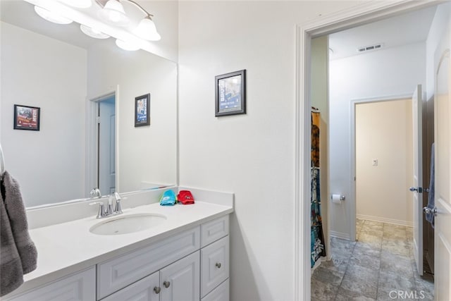 31572 Via Del Paso, Winchester, CA 92596 - bathroom with vanity and baseboards