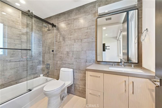 35481/2 Multiview Dr, Los Angeles, CA 90068 - bathroom with bath / shower combo with glass door, vanity, and tile walls