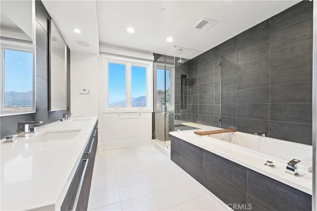 35481/2 Multiview Dr, Los Angeles, CA 90068 - full bath with tile patterned floors, a garden tub, a shower stall, double vanity, and recessed lighting