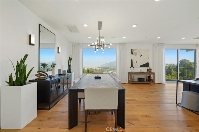 35481/2 Multiview Dr, Los Angeles, CA 90068 - dining room featuring a chandelier, light wood-style flooring, and recessed lighting