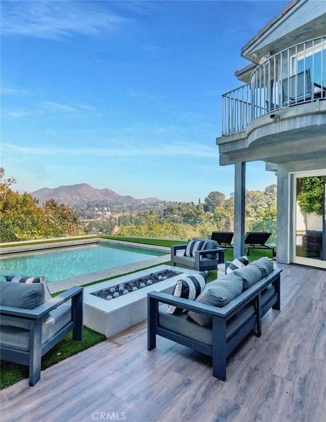 35481/2 Multiview Dr, Los Angeles, CA 90068 - deck with a mountain view, an outdoor living space with a fire pit, and a patio