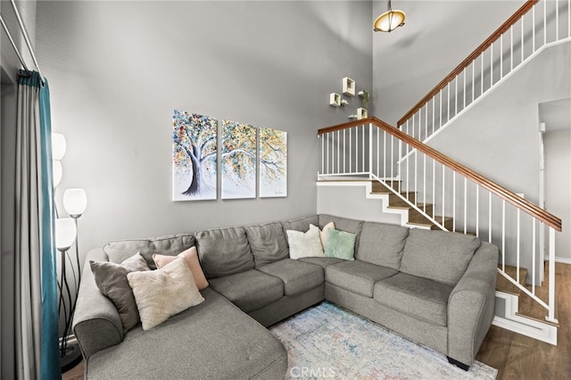 3732 Calle Monada, Riverside, CA 92503 - living room featuring stairs, wood finished floors, and a high ceiling