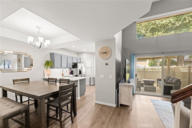 3732 Calle Monada, Riverside, CA 92503 - dining area with a chandelier, light wood finished floors, and recessed lighting