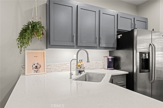 3732 Calle Monada, Riverside, CA 92503 - kitchen with stainless steel refrigerator with ice dispenser, gray cabinetry, and decorative backsplash