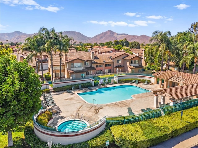 3732 Calle Monada, Riverside, CA 92503 - community pool featuring a community hot tub, a mountain view, a residential view, and a patio