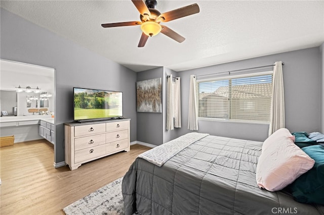3732 Calle Monada, Riverside, CA 92503 - bedroom with light wood-style floors, a textured ceiling, and a ceiling fan