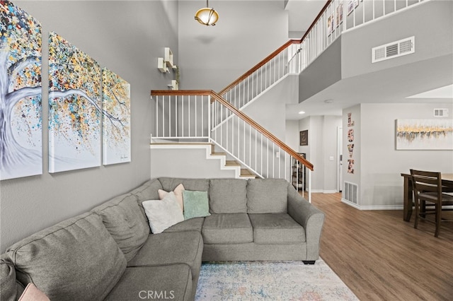 3732 Calle Monada, Riverside, CA 92503 - living area with stairs, wood finished floors, and a high ceiling