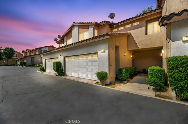 3732 Calle Monada, Riverside, CA 92503 - view of front of property featuring stucco siding, a tile roof, and a garage