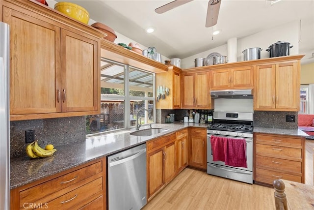10 Roseanna Ct, Chico, CA 95973 - kitchen featuring appliances with stainless steel finishes, tasteful backsplash, under cabinet range hood, light wood-style floors, and lofted ceiling