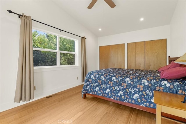 10 Roseanna Ct, Chico, CA 95973 - bedroom featuring wood finished floors, two closets, recessed lighting, lofted ceiling, and a ceiling fan
