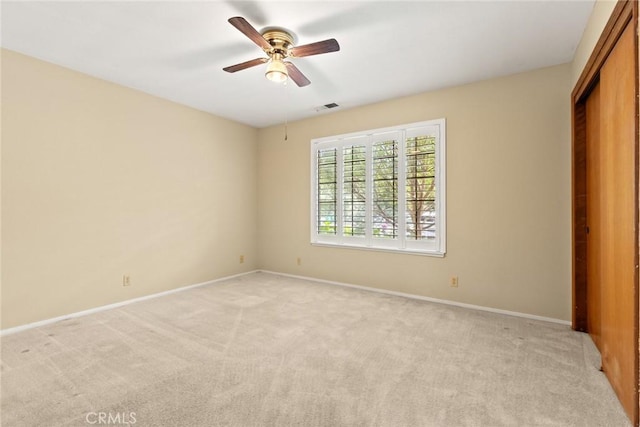 10 Roseanna Ct, Chico, CA 95973 - unfurnished bedroom featuring light carpet, a closet, and ceiling fan