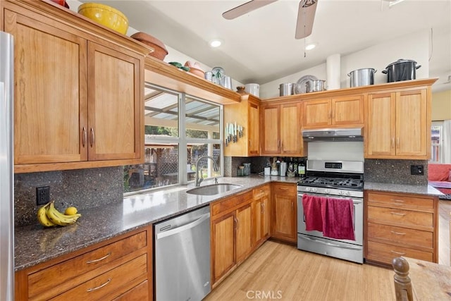 10 Roseanna Ct, Chico, CA 95973 - kitchen with stainless steel appliances, decorative backsplash, under cabinet range hood, light wood-type flooring, and lofted ceiling