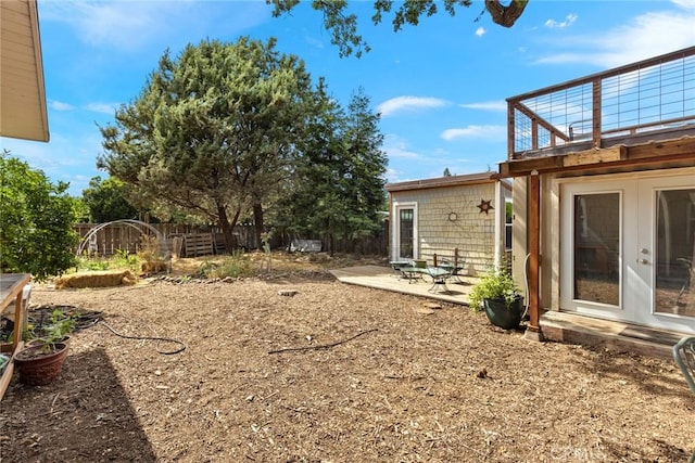 10 Roseanna Ct, Chico, CA 95973 - fenced backyard with a patio area and a balcony