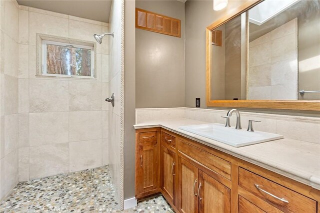 10 Roseanna Ct, Chico, CA 95973 - bathroom featuring tiled shower and vanity