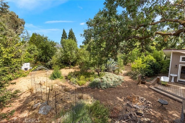 10 Roseanna Ct, Chico, CA 95973 - view of yard featuring a deck