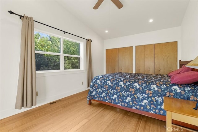 10 Roseanna Ct, Chico, CA 95973 - bedroom with wood finished floors, two closets, vaulted ceiling, recessed lighting, and ceiling fan