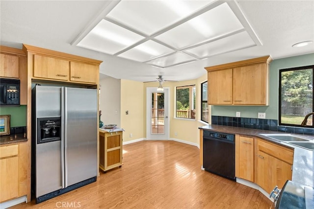 10 Roseanna Ct, Chico, CA 95973 - kitchen with black appliances, plenty of natural light, light wood-style flooring, and dark countertops