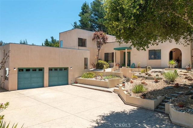 1410 Verde Canyon Rd, Arroyo Grande, CA 93420 - view of front of property with an attached garage, stucco siding, and concrete driveway