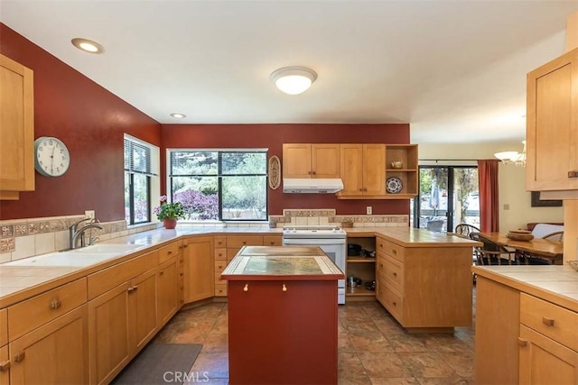1410 Verde Canyon Rd, Arroyo Grande, CA 93420 - kitchen with under cabinet range hood, open shelves, white range with electric stovetop, tile counters, and light brown cabinetry