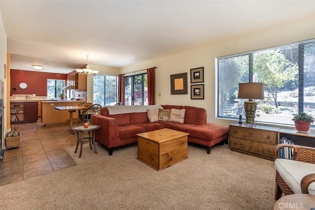1410 Verde Canyon Rd, Arroyo Grande, CA 93420 - living room featuring a chandelier, light colored carpet, and light tile patterned flooring