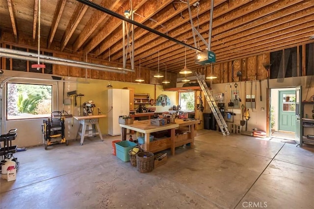 1410 Verde Canyon Rd, Arroyo Grande, CA 93420 - garage featuring a workshop area and a garage door opener