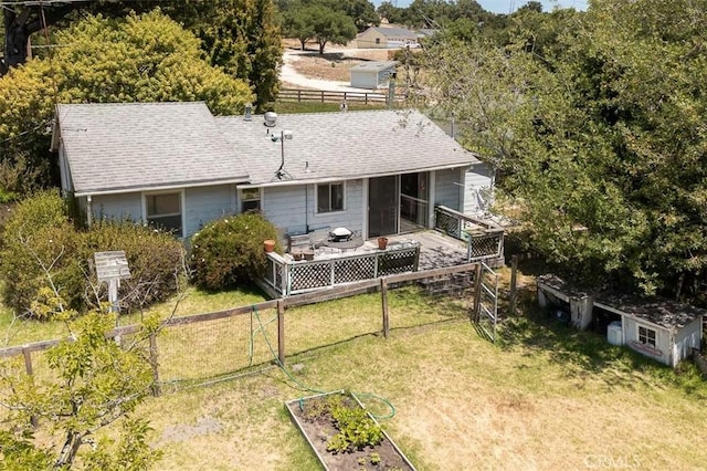 1410 Verde Canyon Rd, Arroyo Grande, CA 93420 - back of property featuring a vegetable garden, roof with shingles, and a wooden deck