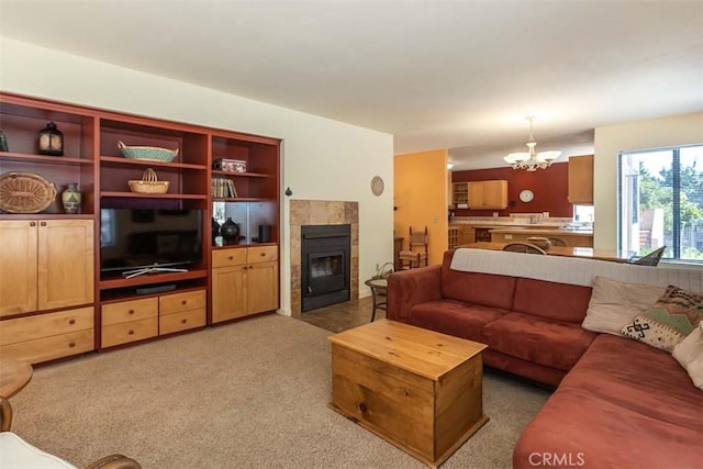 1410 Verde Canyon Rd, Arroyo Grande, CA 93420 - living room with a chandelier, light colored carpet, and a tiled fireplace