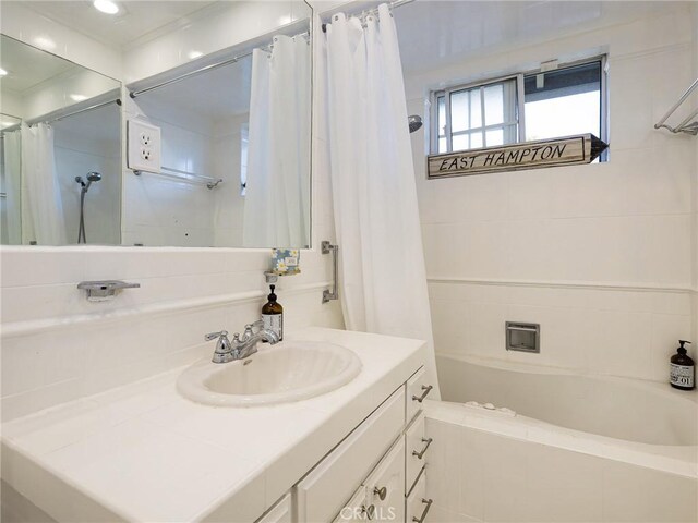 13404 Arcturus Ave, Gardena, CA 90249 - bathroom with vanity and shower / tub combo
