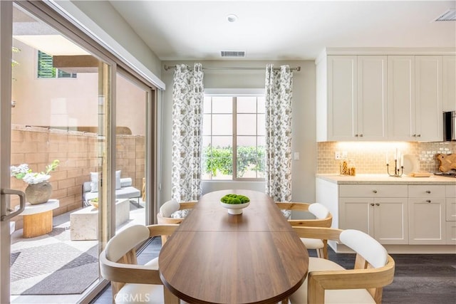 134 Milky Way, Irvine, CA 92618 - dining room featuring dark wood finished floors