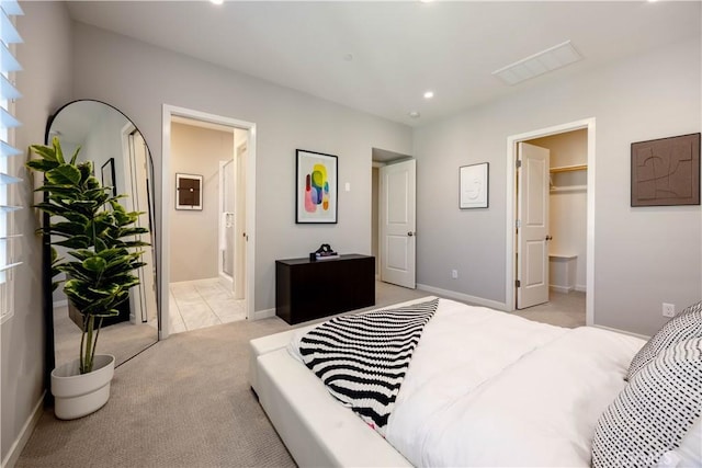 134 Milky Way, Irvine, CA 92618 - bedroom featuring light colored carpet, recessed lighting, ensuite bath, and a spacious closet