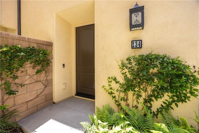 134 Milky Way, Irvine, CA 92618 - view of exterior entry with stucco siding