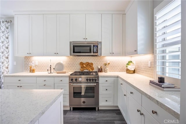 134 Milky Way, Irvine, CA 92618 - kitchen with stainless steel appliances and white cabinets