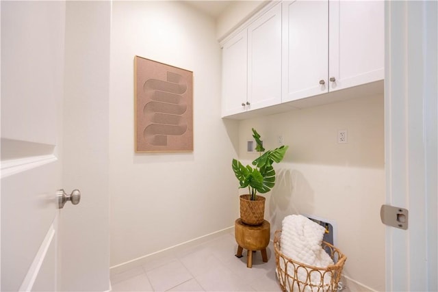 134 Milky Way, Irvine, CA 92618 - laundry room with baseboards and light tile patterned floors